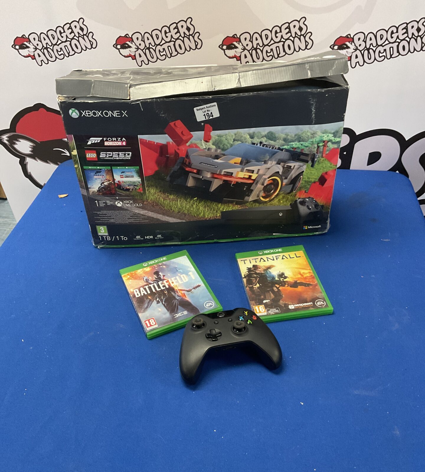 Xbox One X console with remote, titanfall and battlefield 1