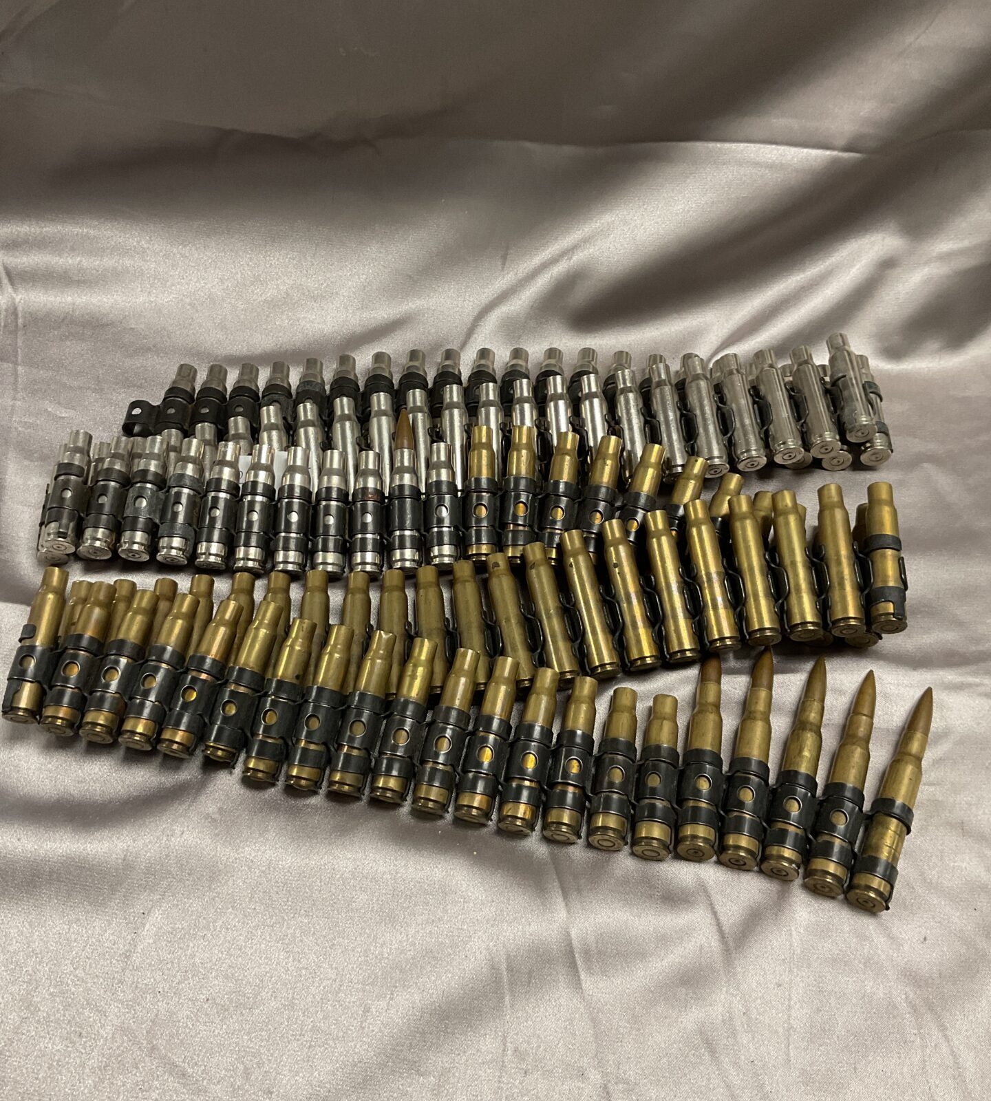 Approximately 5ft Belt of brass spent bullets