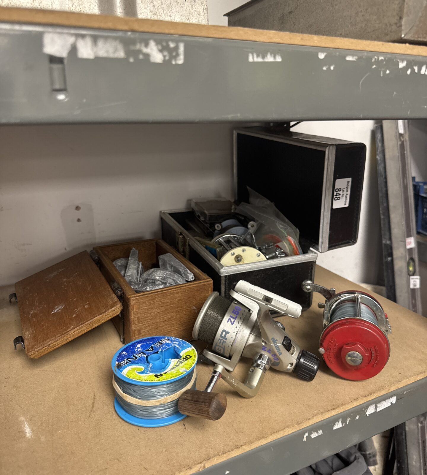 Selection of course & sea fishing items inc weights, reels & cord