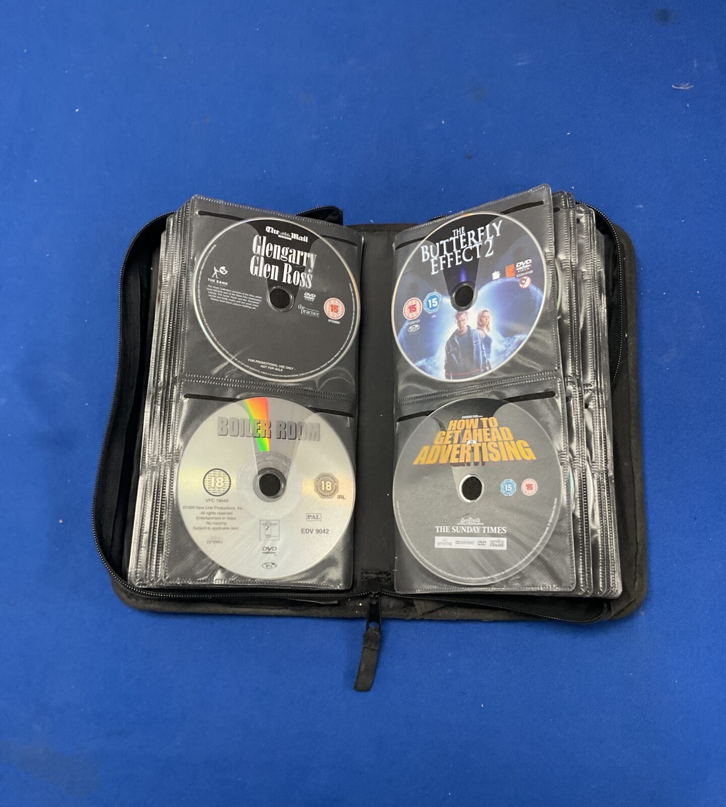 Case full of assorted DVDs
