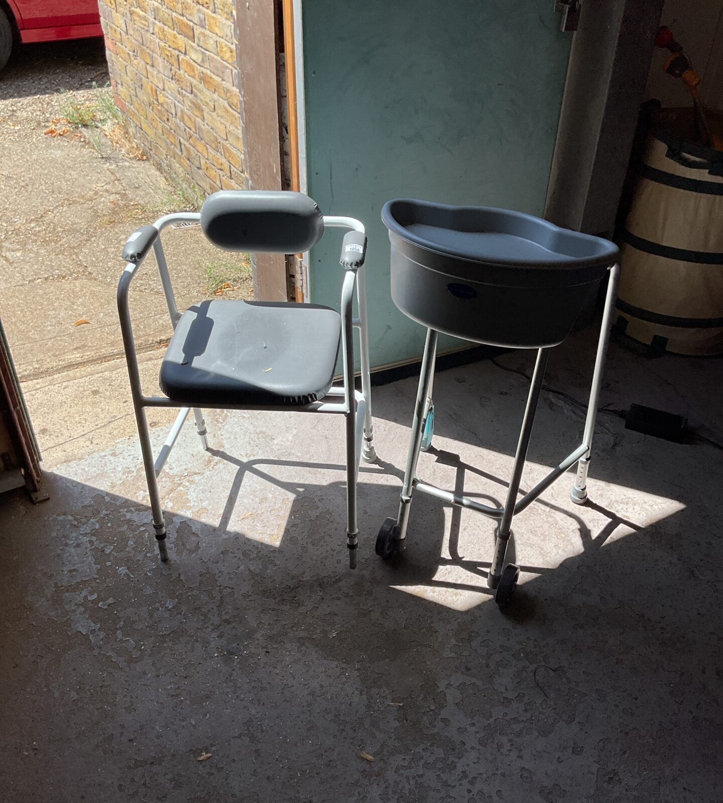 Mobility perching stool with armrest and the Buckingham walking frame caddy