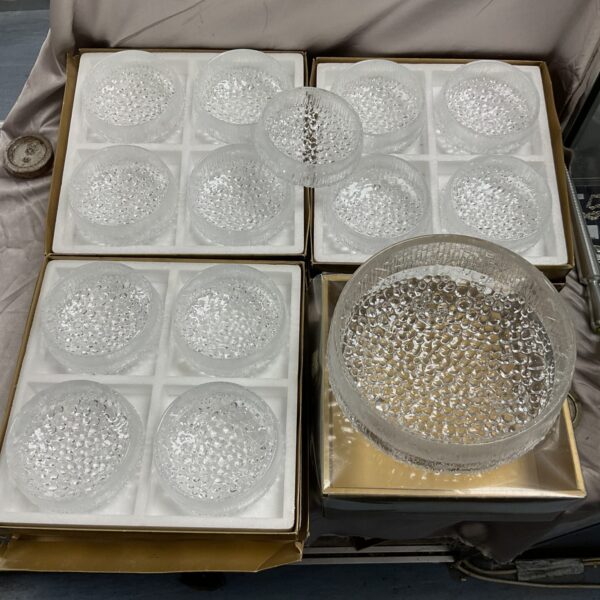Group of vintage Iittala Ultima Thule bowls with textured glass.