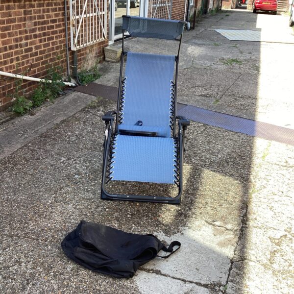 New executive sun lounger in a garden setting.