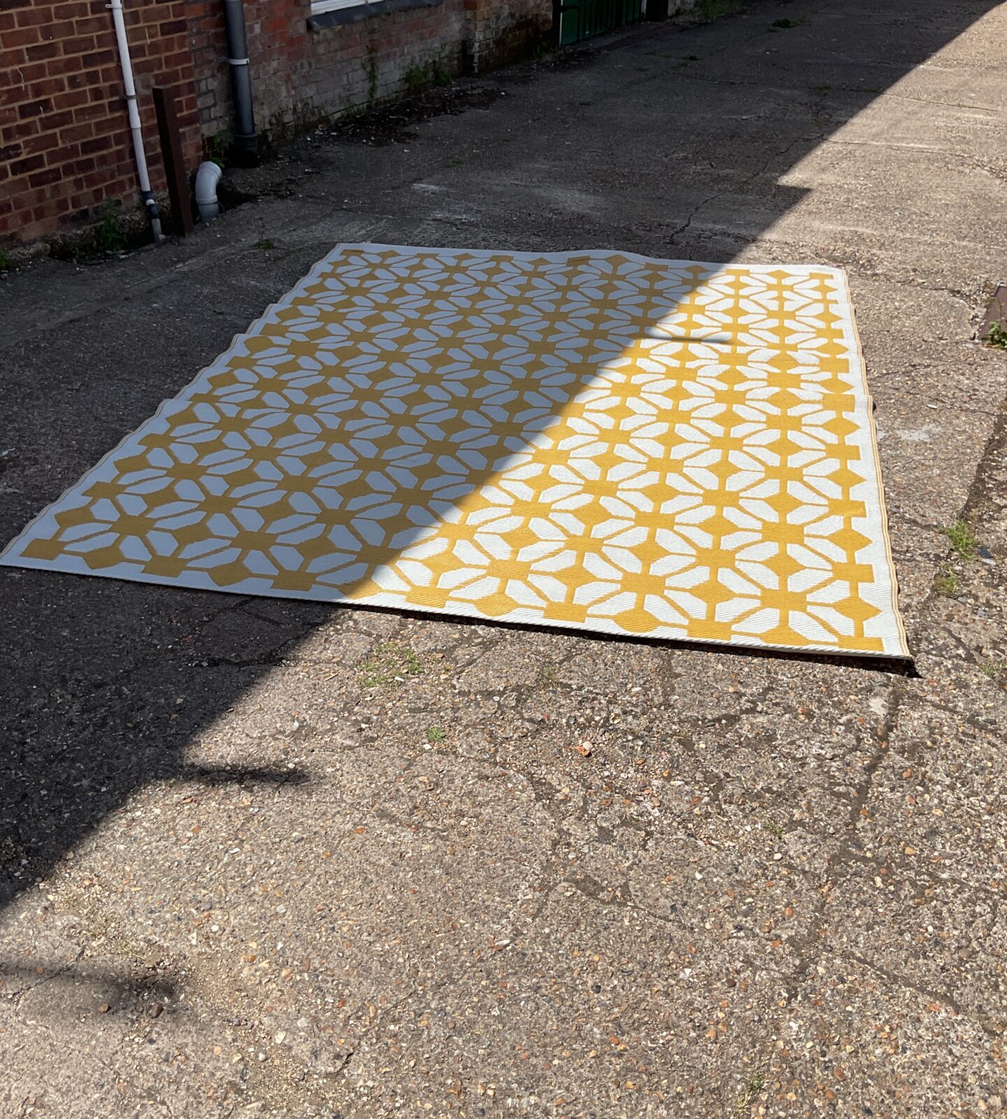 Large yellow and white outdoor rug 10ftx8ft approx
