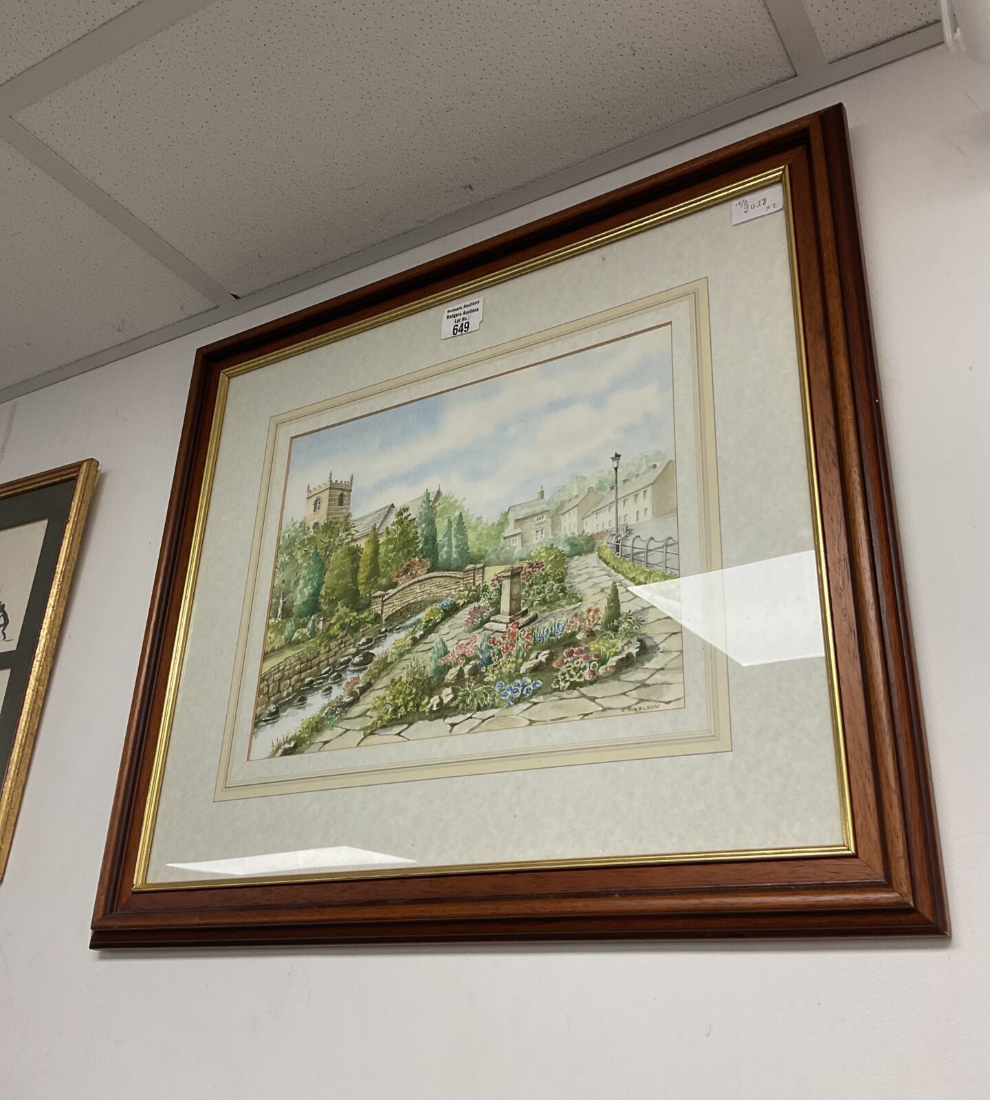 N s nelson framed watercolour of a village church with stream