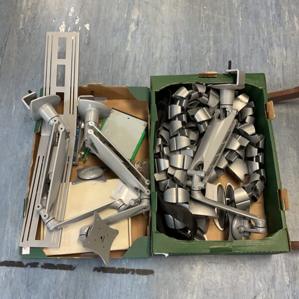 Two trays of computing accessories including screen mount & cable tidy