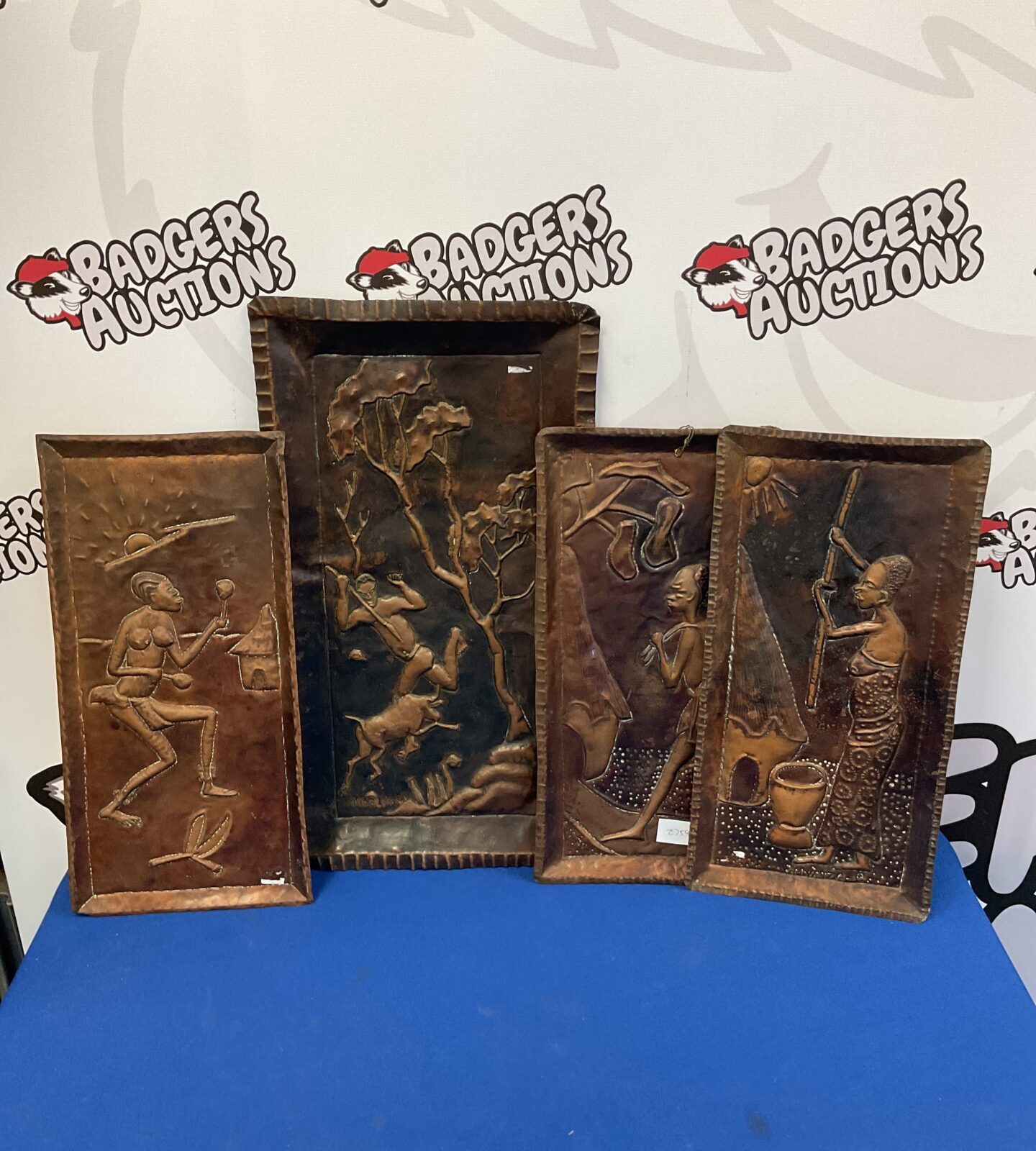 Four vintage African tribal copper trays