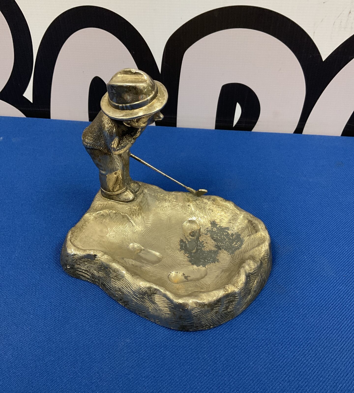 Silver plate golfer in a bunker key dish