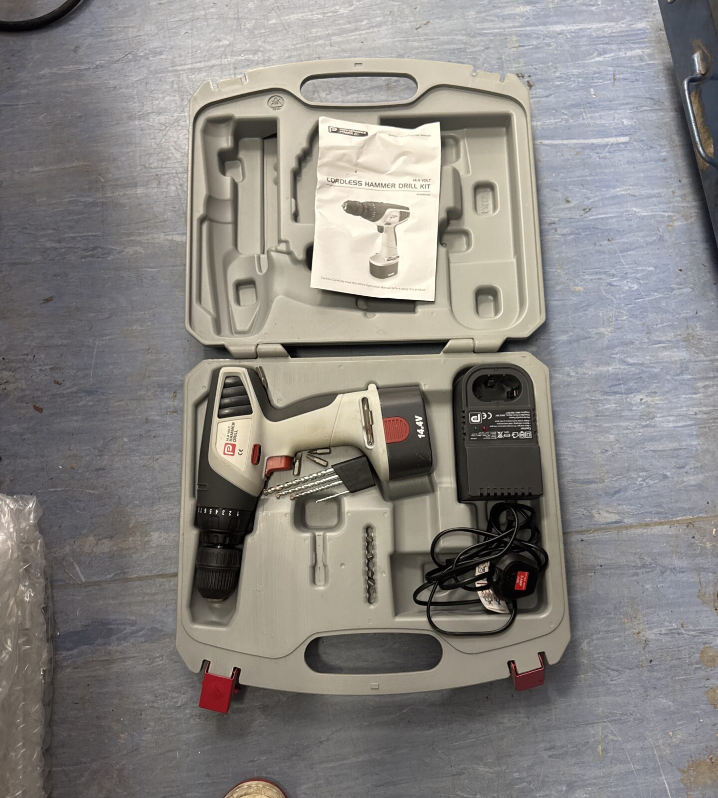 Performance power cordless drill with charger - powers on, low battery