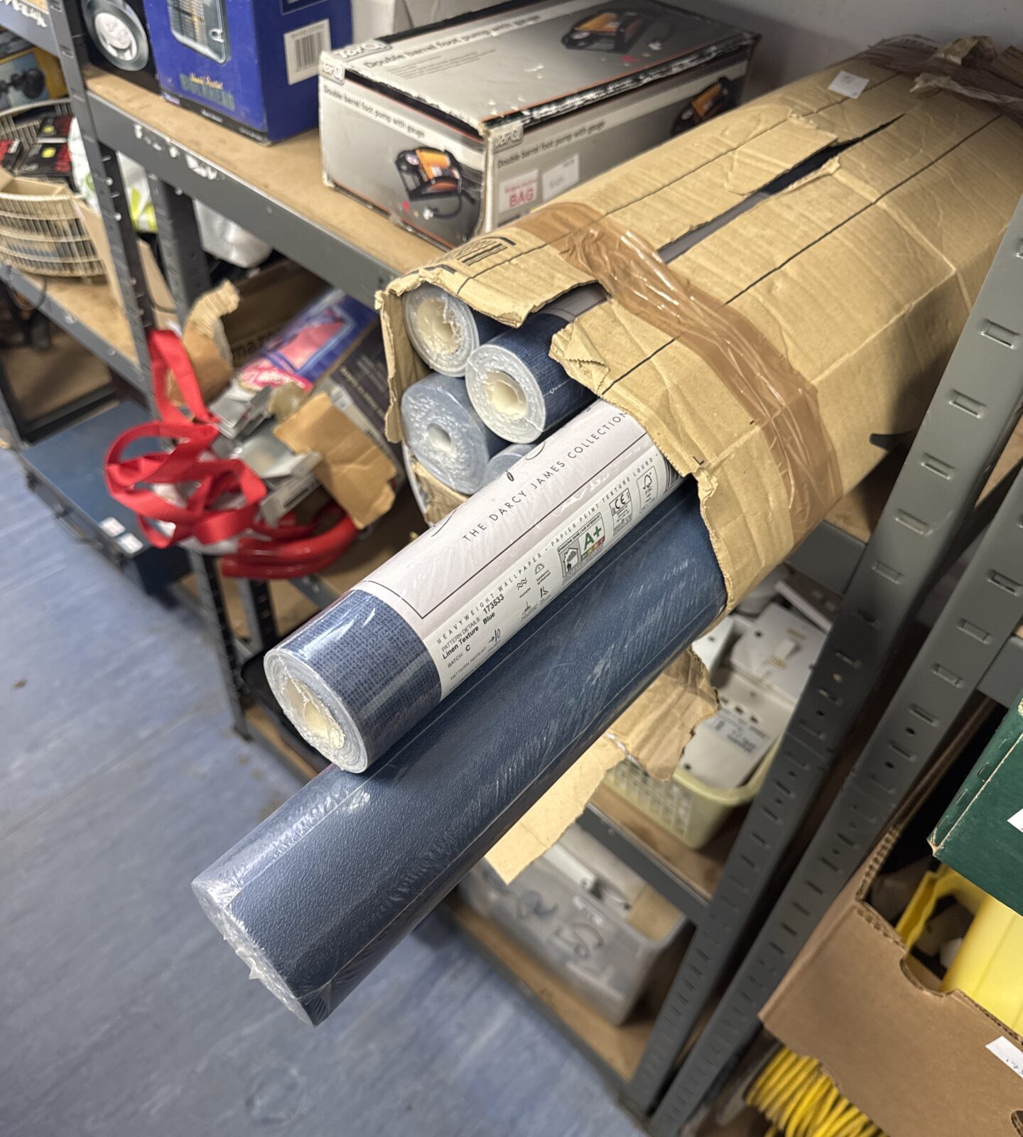 Six rolls of blue linen effect wallpaper (two different lots of three rolls)