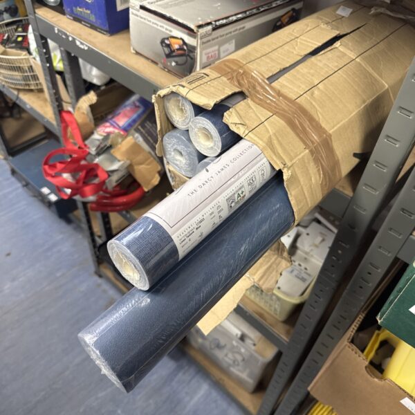Six rolls of blue linen effect wallpaper (two different lots of three rolls)