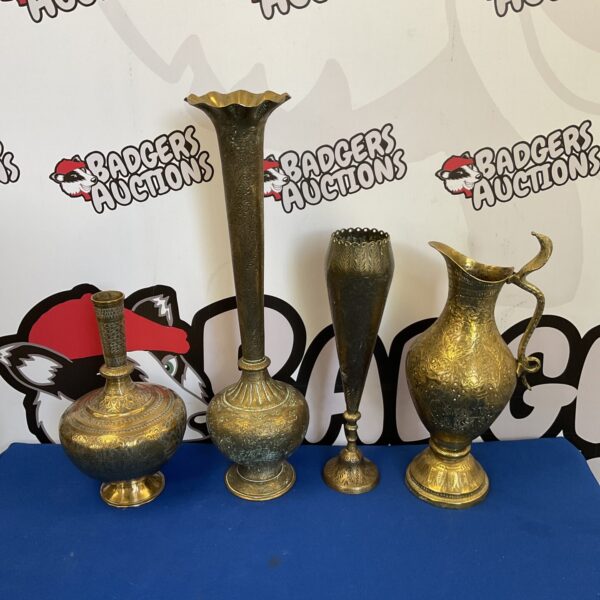 Three heavily engraved indian brass vases with pitcher