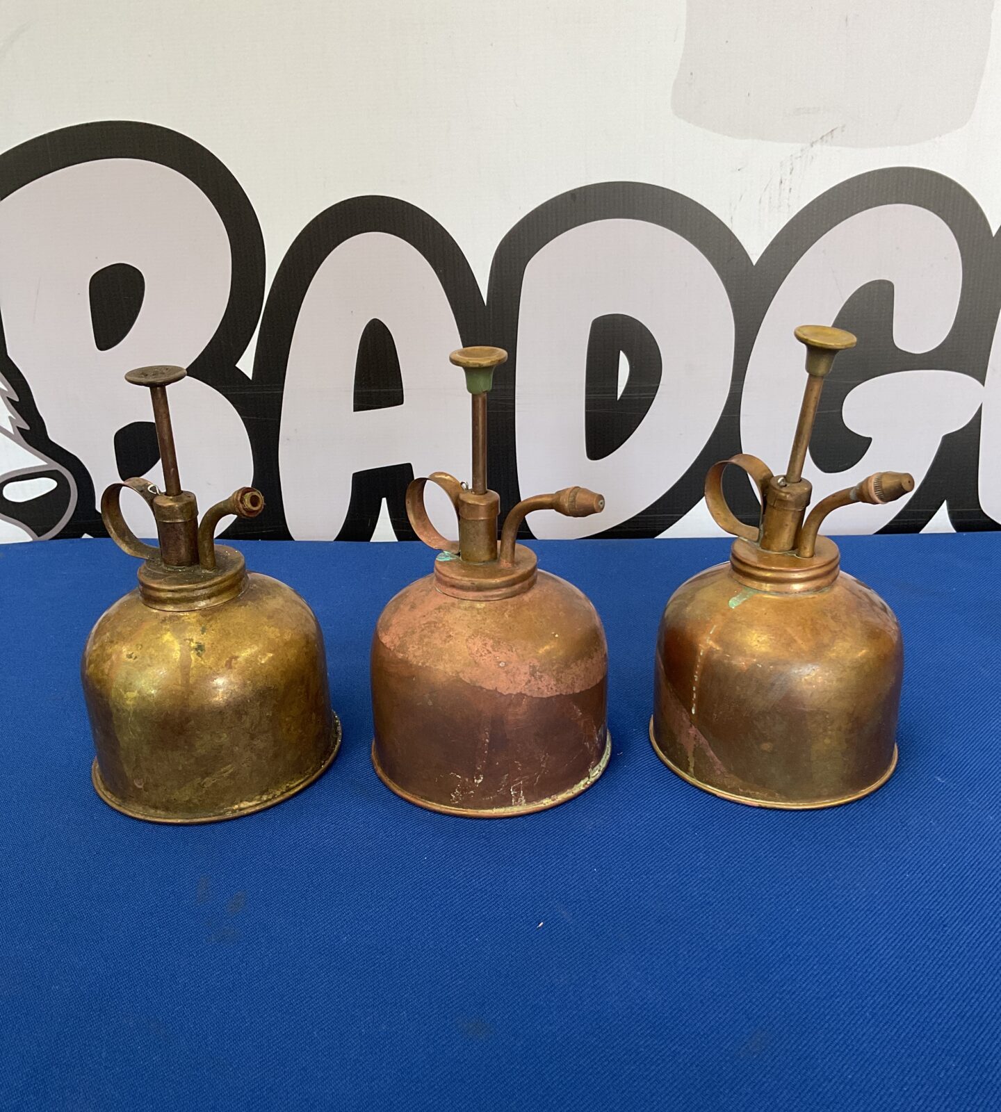 Three vintage brass oil cans