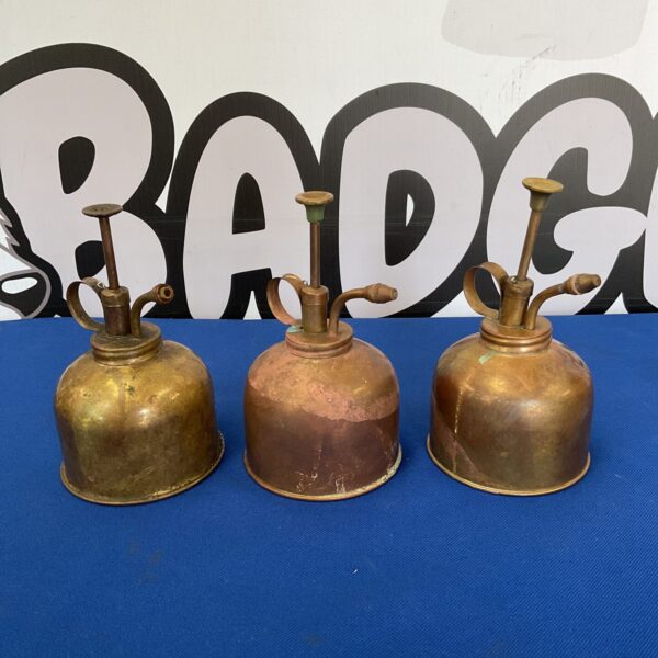 Three vintage brass oil cans