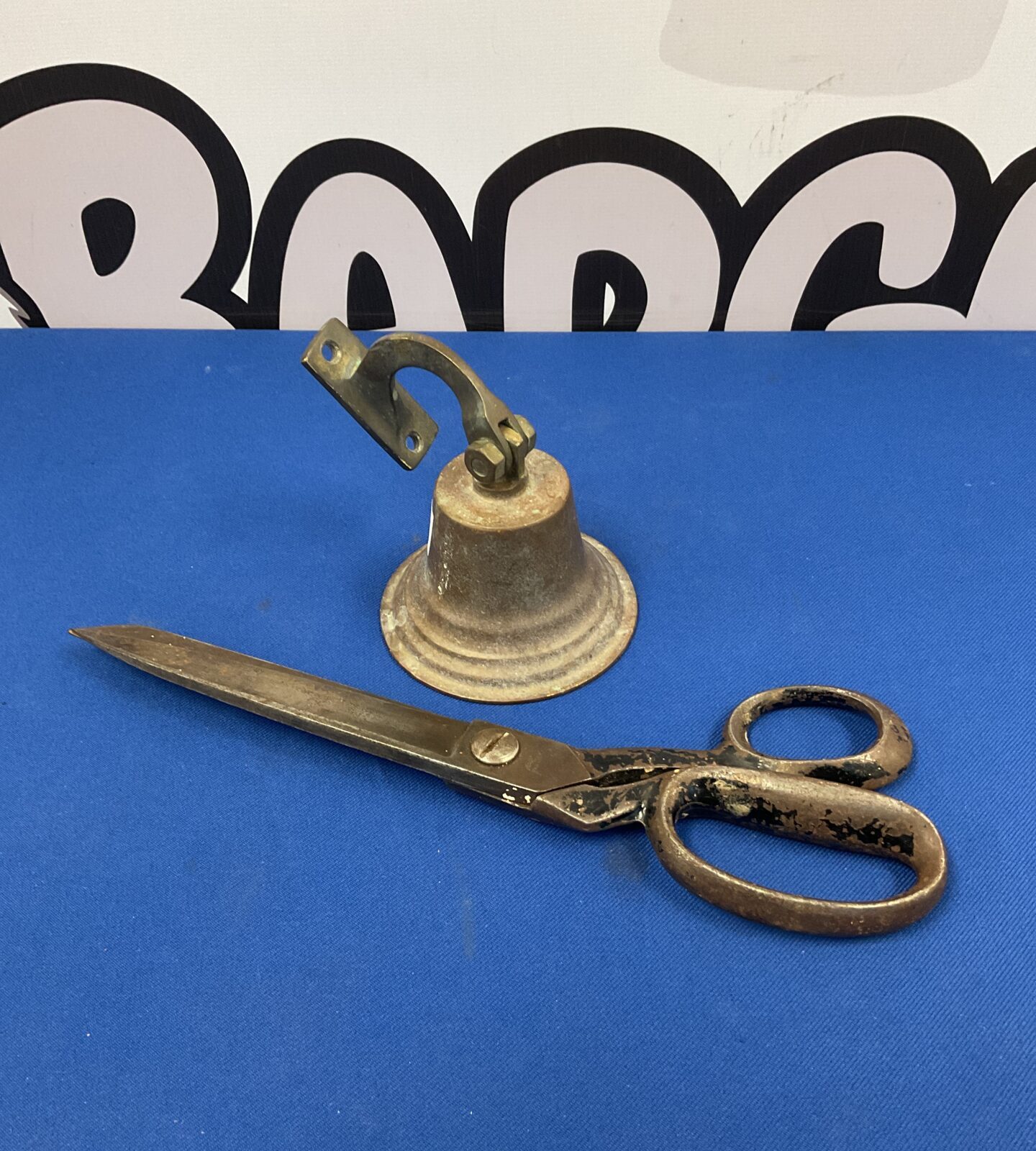 Vintage shop bell and pair Tailors wilkinson sword Scissors