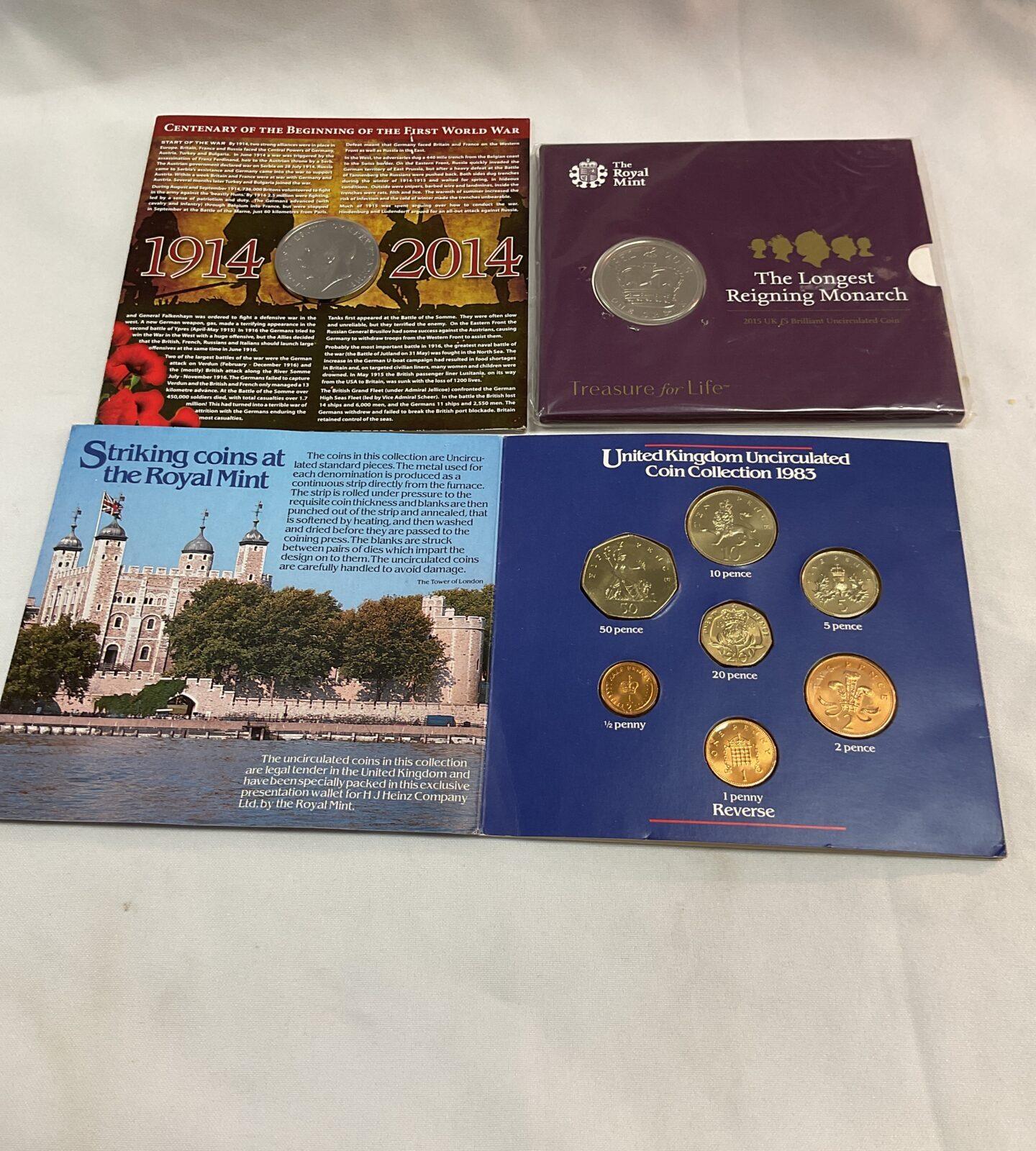framed set of windsor monarchs pennies and two coins of great britain commemorative sets