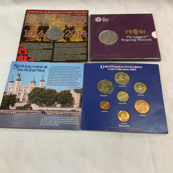 framed set of windsor monarchs pennies and two coins of great britain commemorative sets