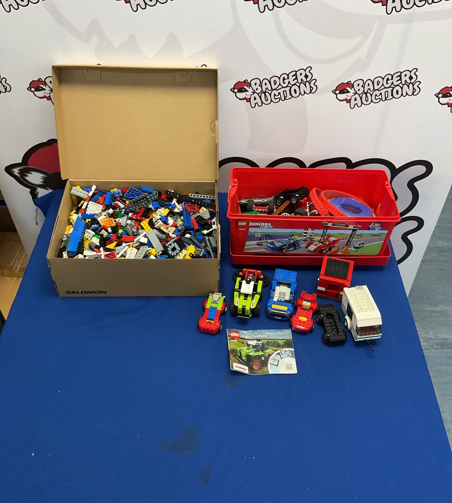 Two boxes of mixed lego inc sets, minifigures and others