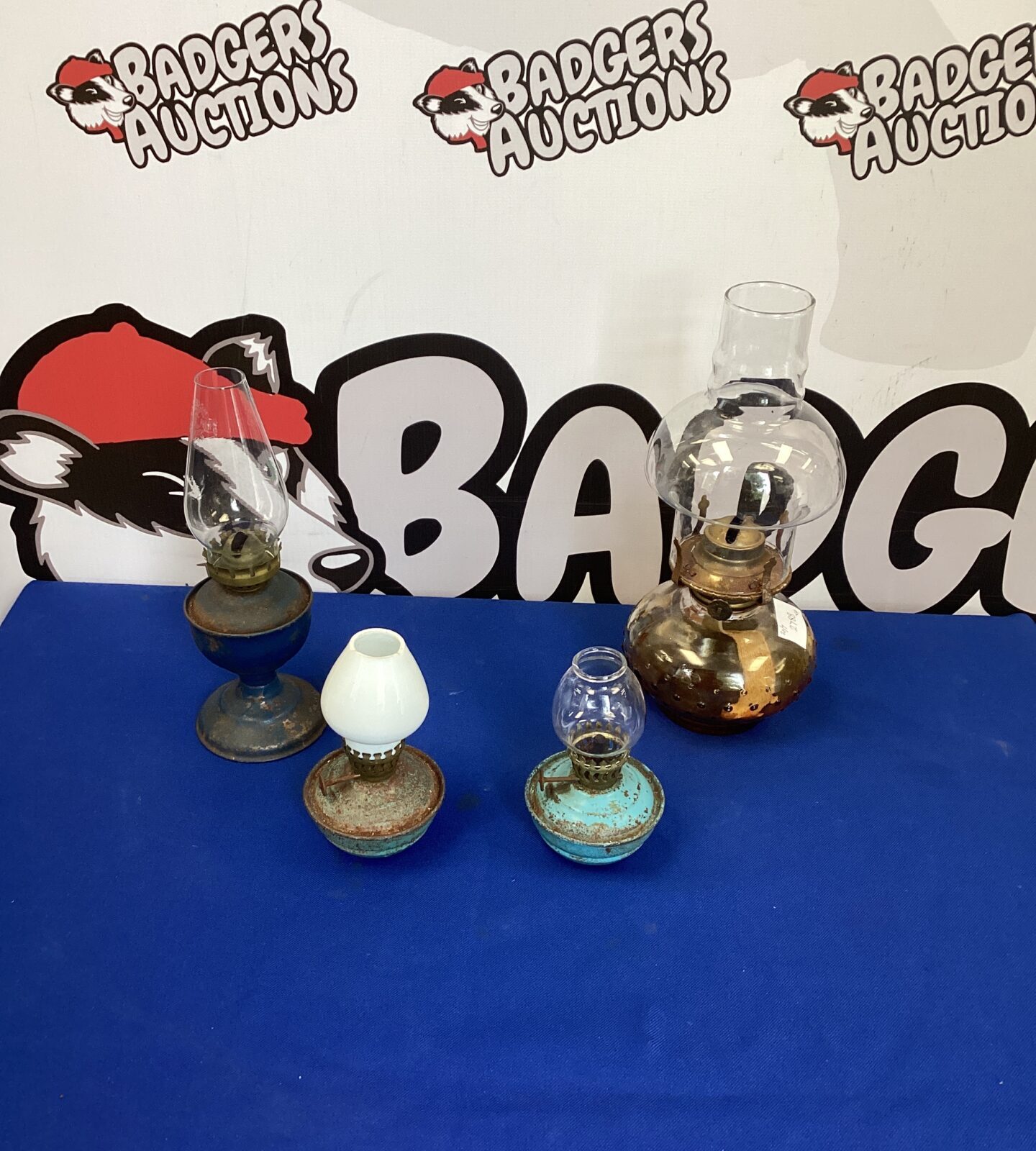 Four vintage small oil lamps
