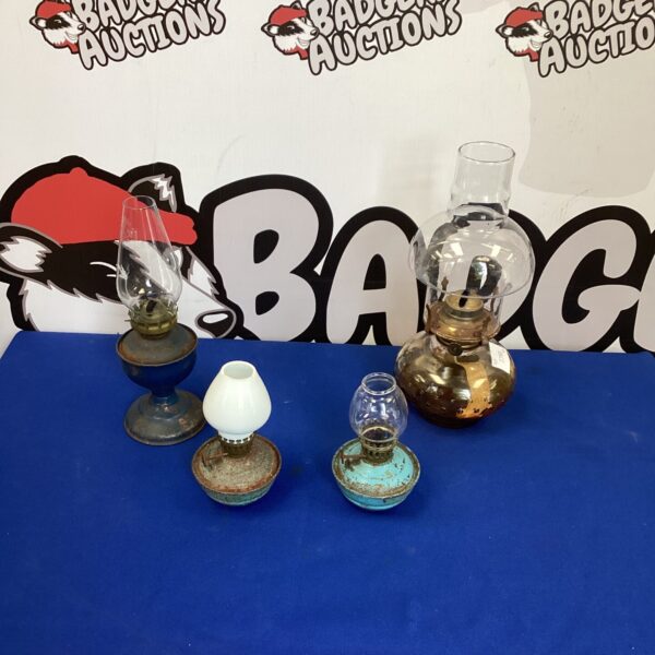 Four vintage small oil lamps