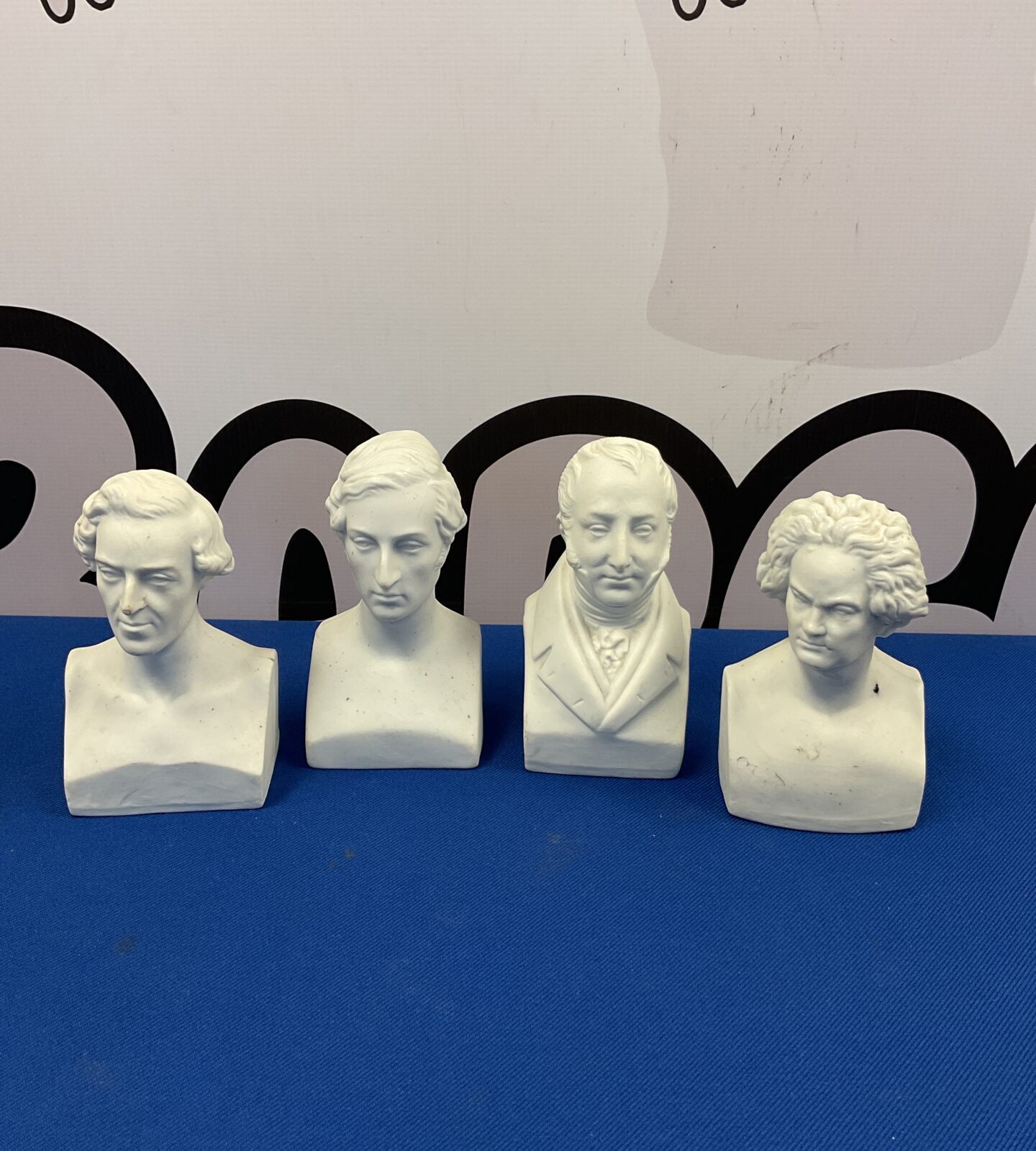Set of four bisque porcelain busts of composers