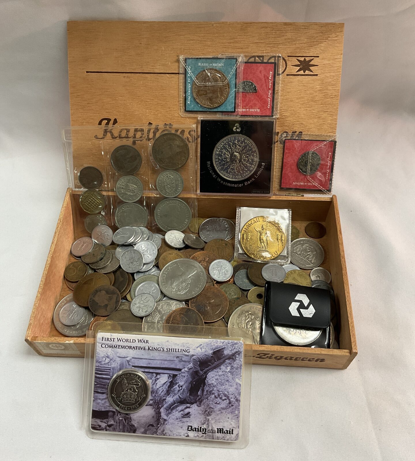 cigar box of  assorted Coins Inc commemorative coins