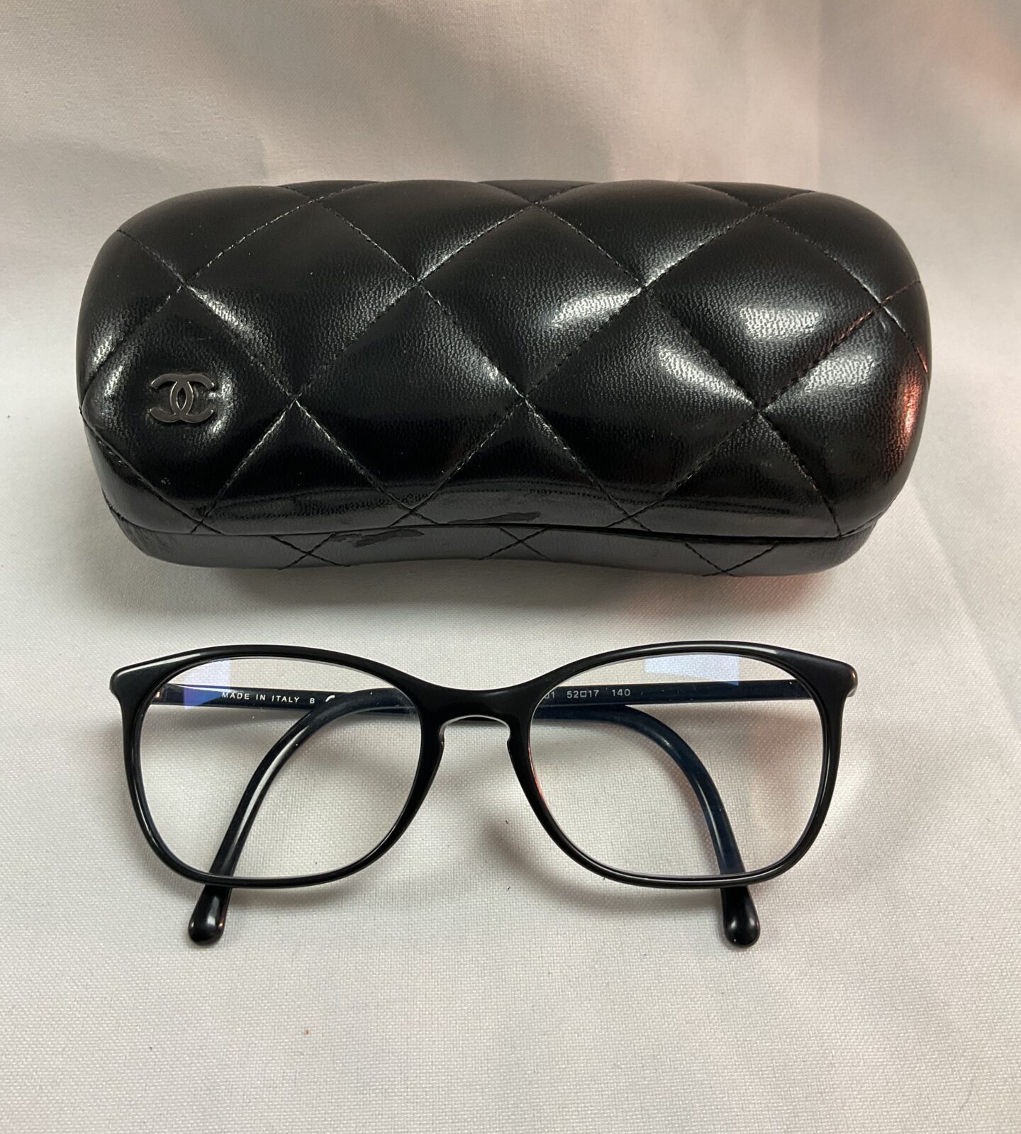 Pair of Chanel reading glasses in case