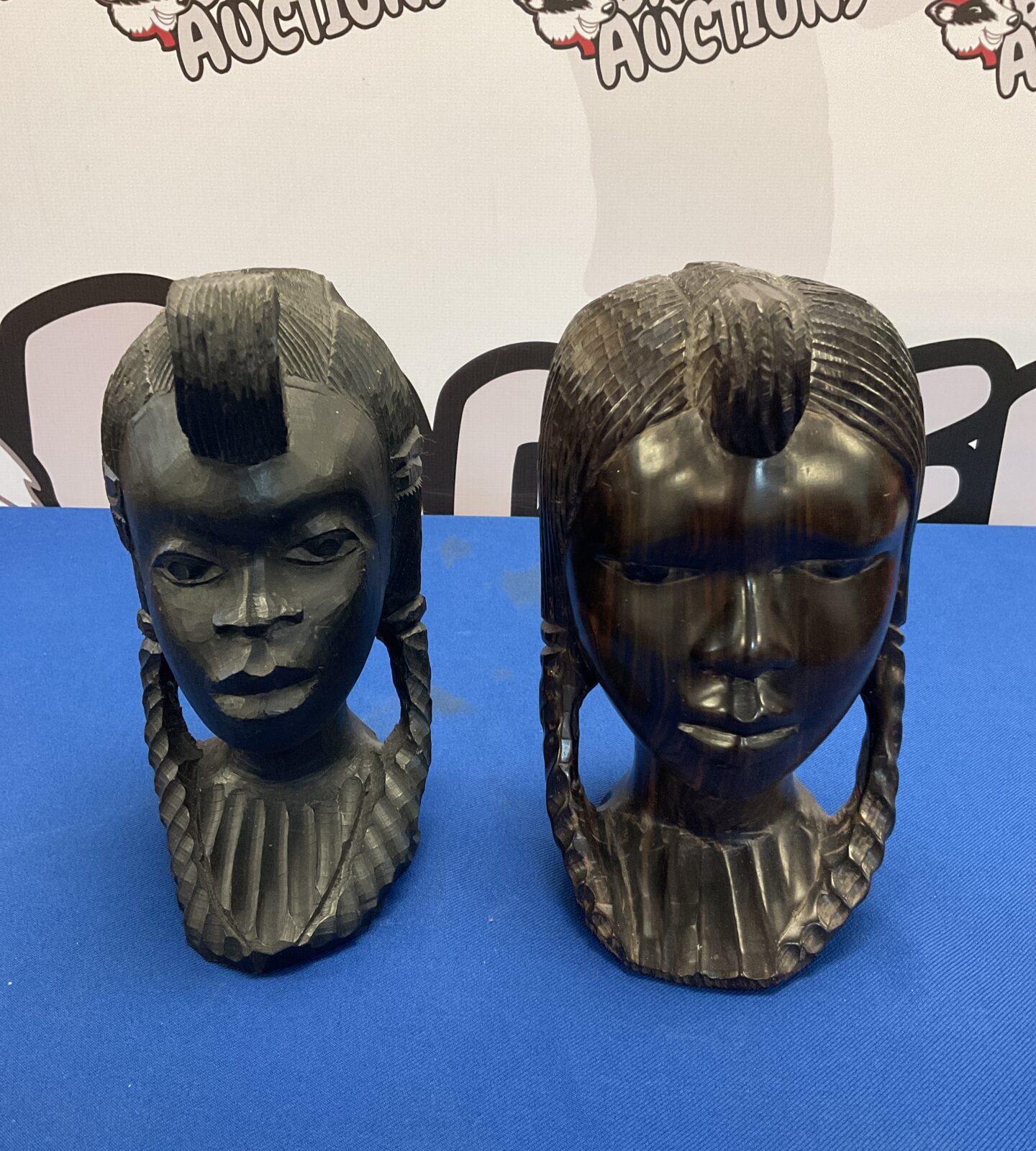 Two vintage hand carved African busts of tribal girls