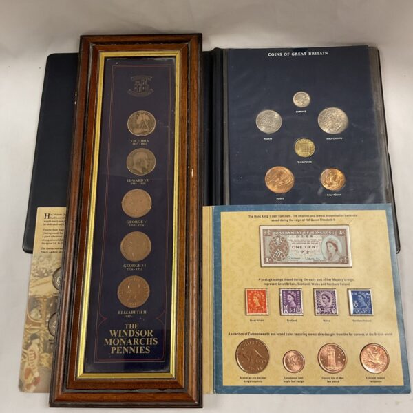 framed set of windsor monarchs penniesand two coins of great britain commemorative sets