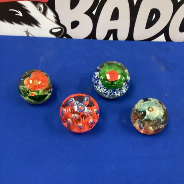 Four  Murano Paperweights