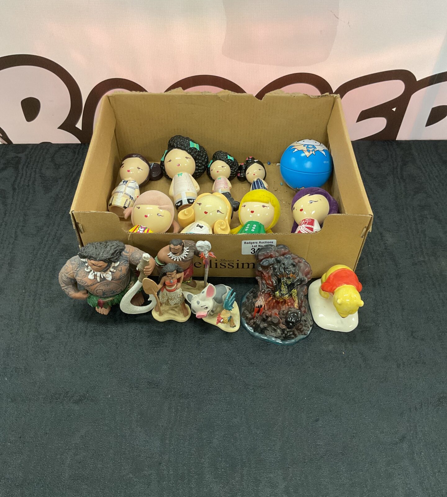 Collection of harajuku lovers wicked style bottle tops with moana figurines and royal doulton winnie the pooh ceramic figure