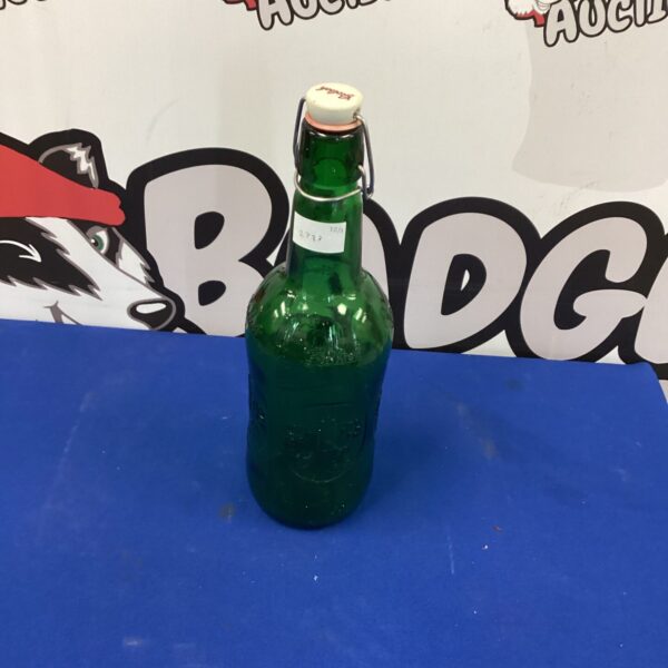 Large vintage Grolsch beer bottle, a classic collectable.
