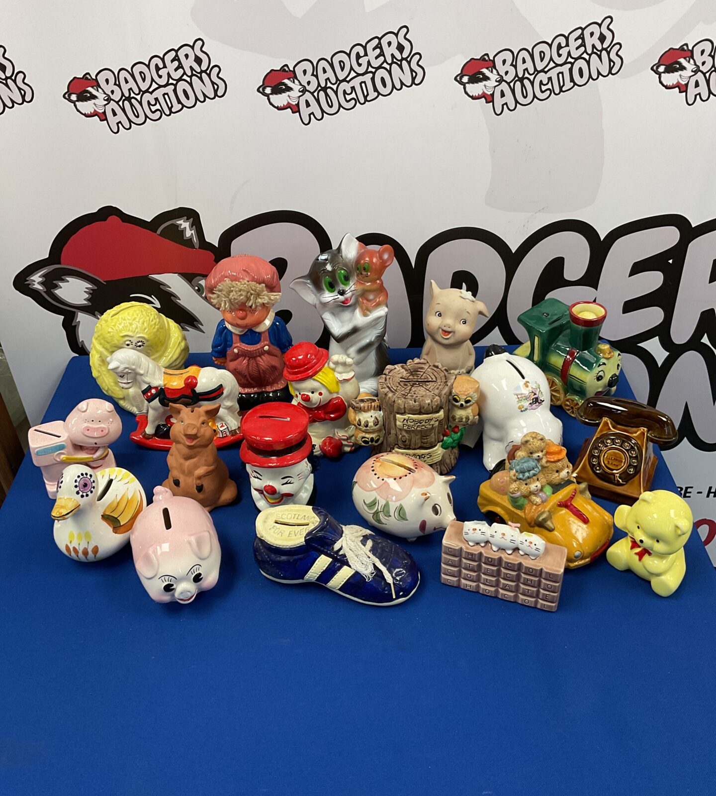 Collection of moneyboxes including pigs & fujika cats