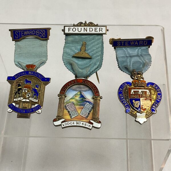 Three Masonic jewels two hallmarked silver steward and enamel founders jewel