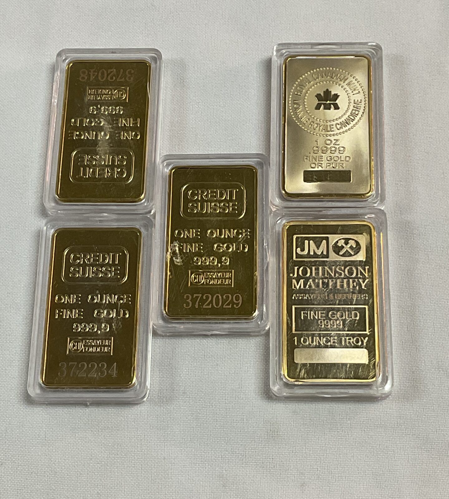 Five commemorative replica credit suisse one ounce 999 gold bar