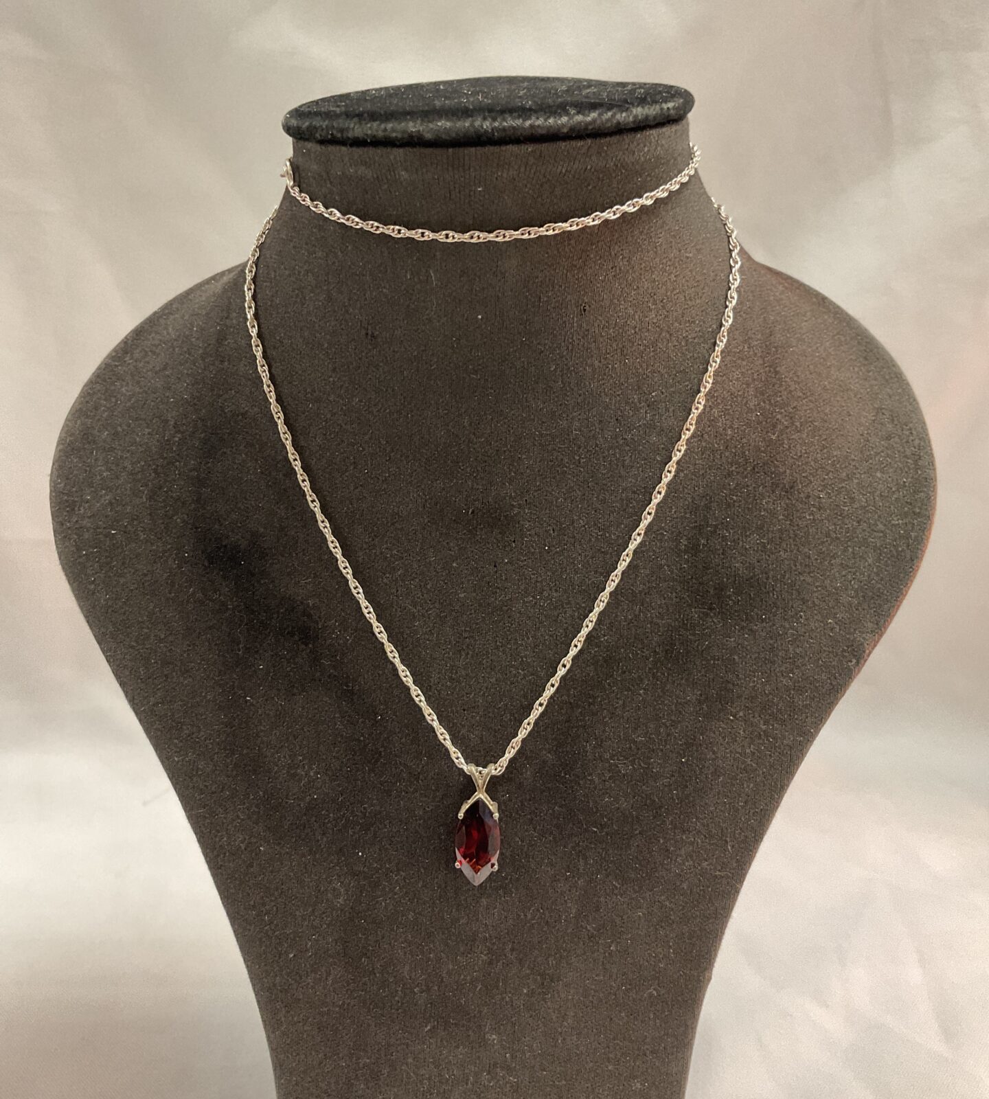 vintage silver 925 22” necklace with large faceted cut ruby colour cage pendant