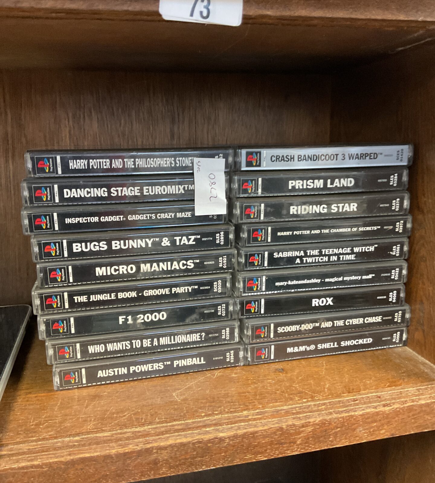 Collection of sony PlayStation games including harry potter & bugs bunny