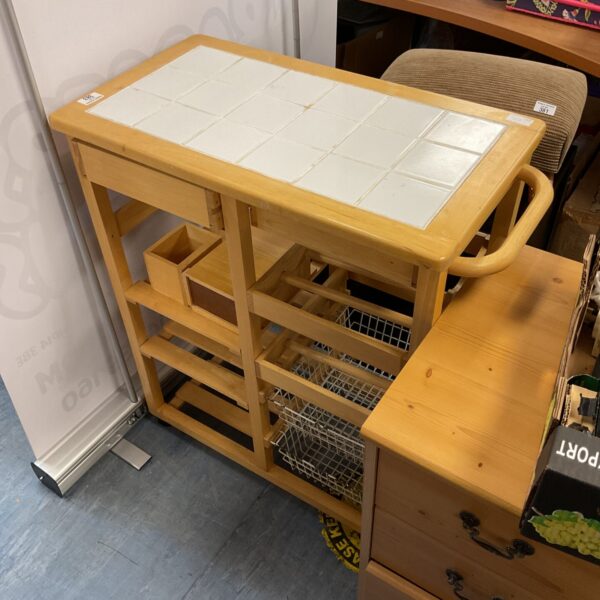 Beach effect tile topped kitchen trolley unit