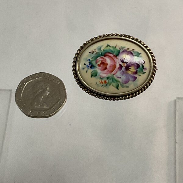 Delicate vintage enamel floral brooch with hand-painted flowers.