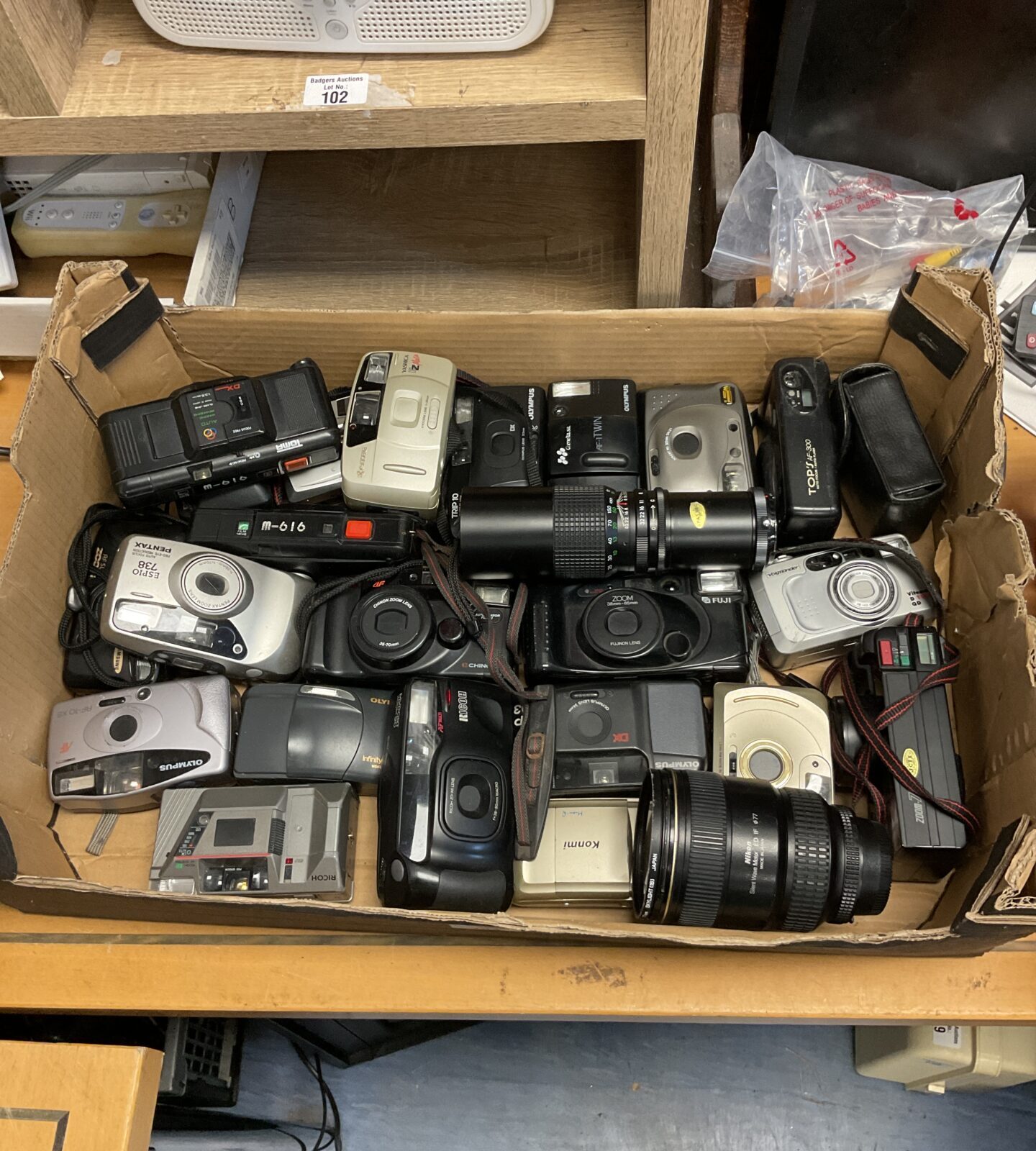 Large lot of 35mm cameras & lenses including nikon ed if 077 lens