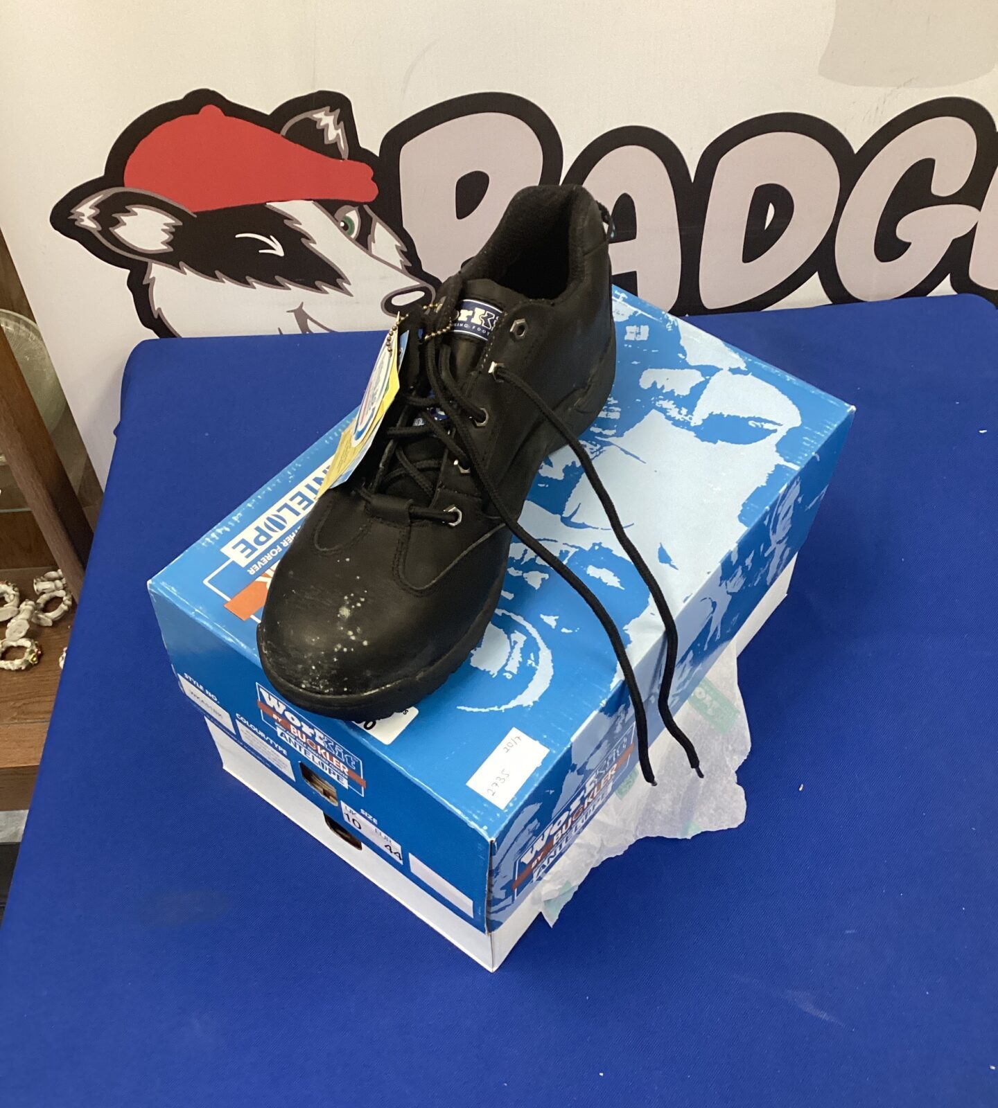 Pair of size 10 safety shoes by buckler