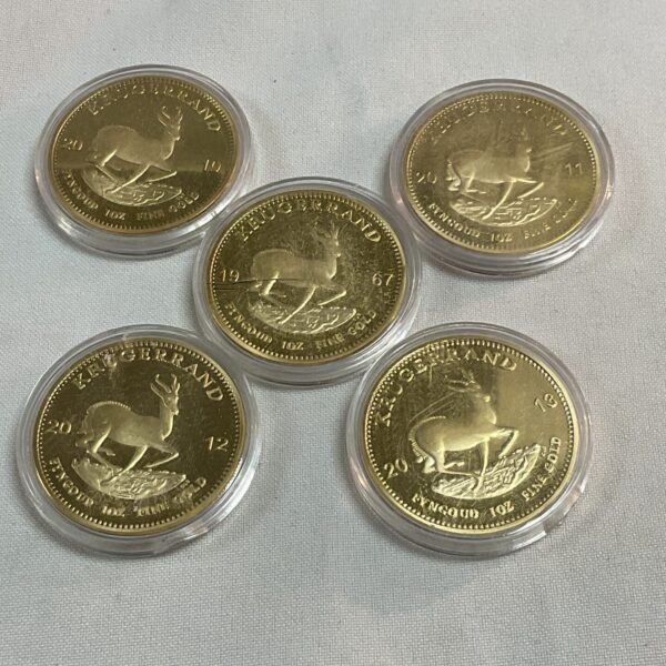 Five replica commemorative krugerands