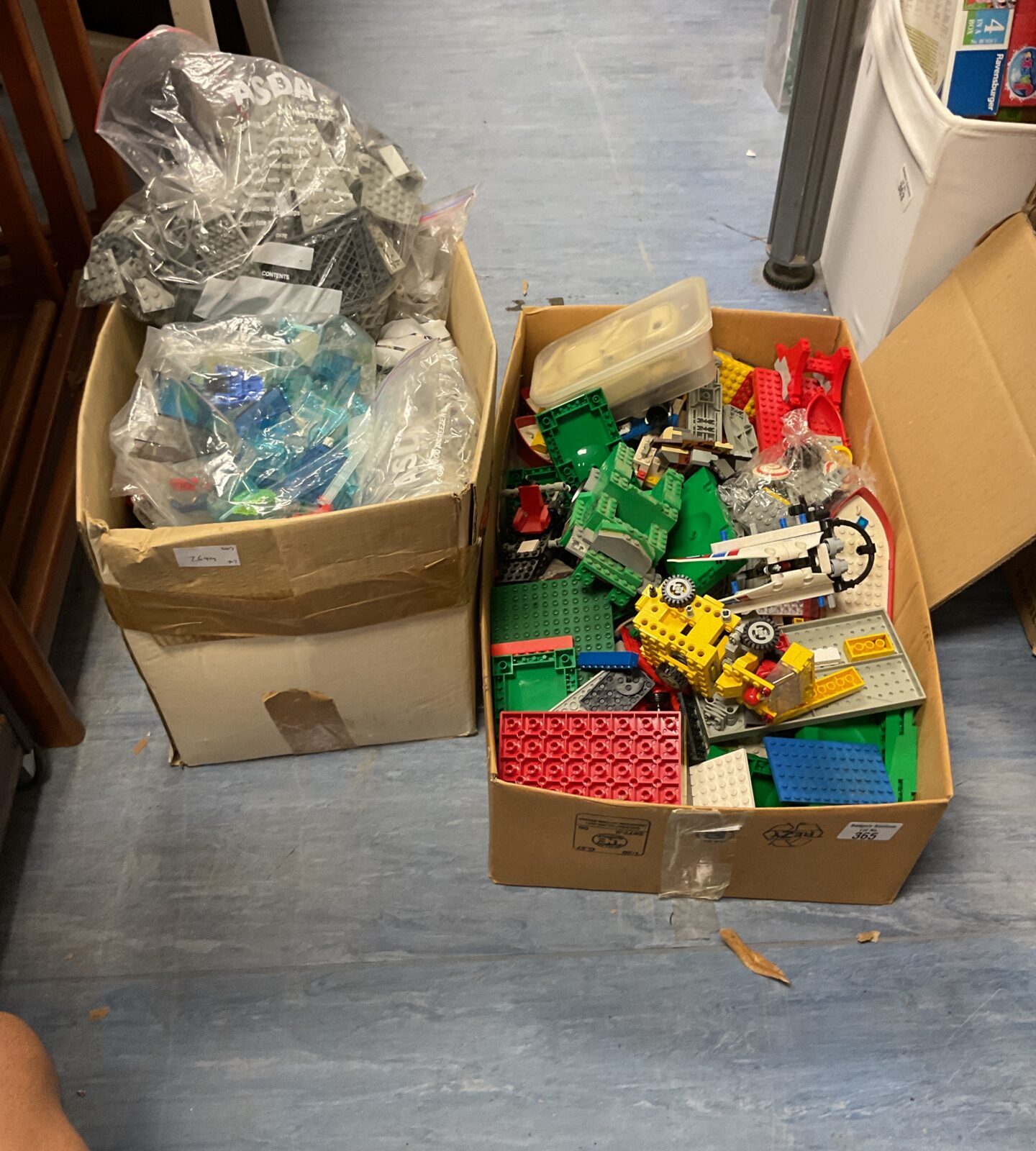 Two boxes of mixed lego inc sets