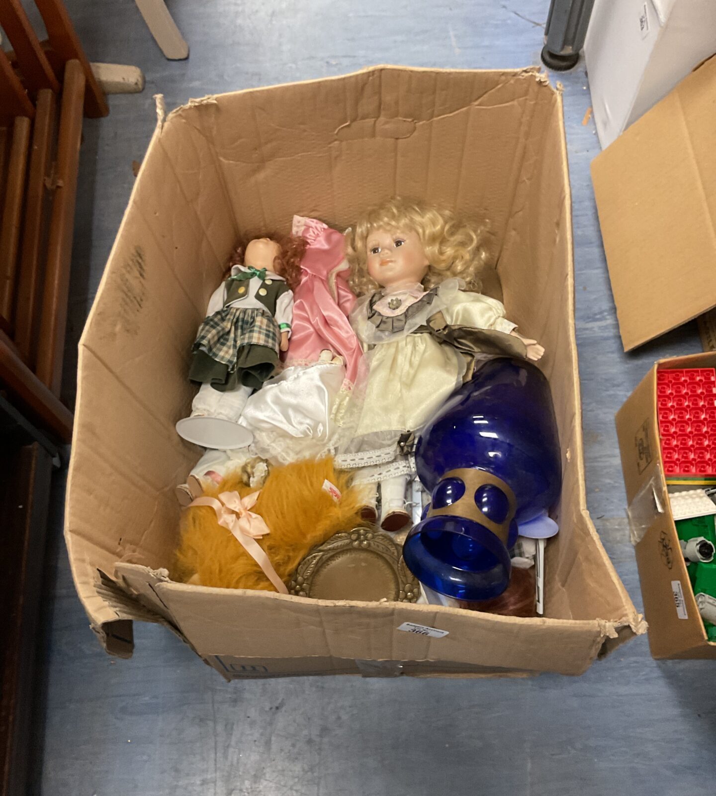 Box of vintage porcelain dolls inc blue vase