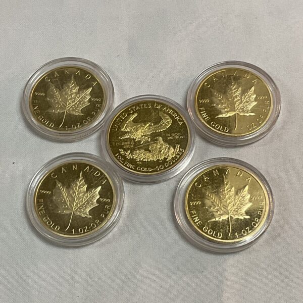Four replica Canadian 50 dollars commemorative gold coins and USA  50 dollars coin