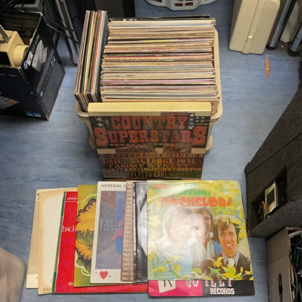 Collection of 12” vinyl records including country music