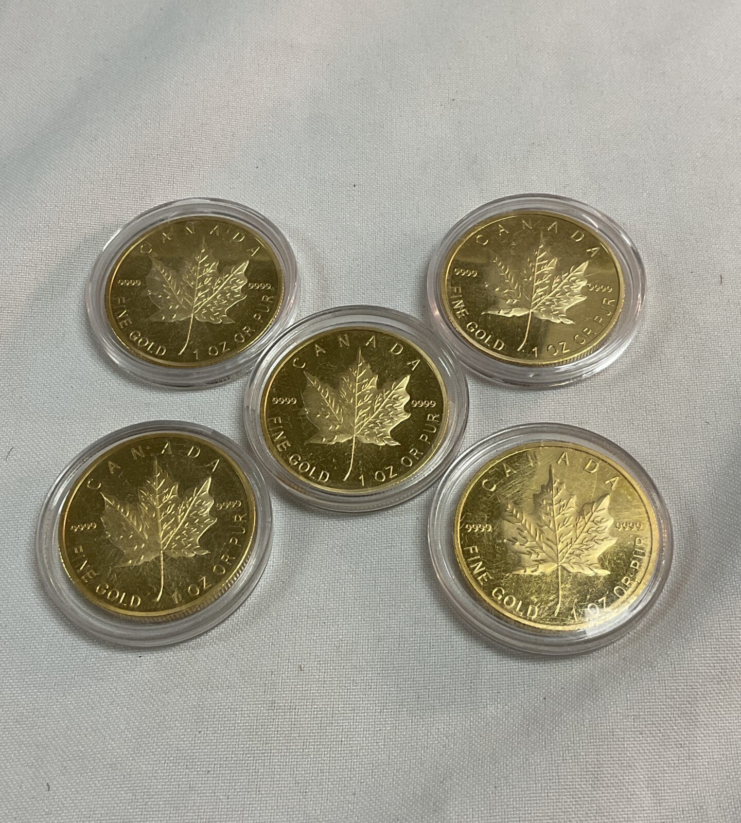Five replica commemorative  Canada 50 dollar coins