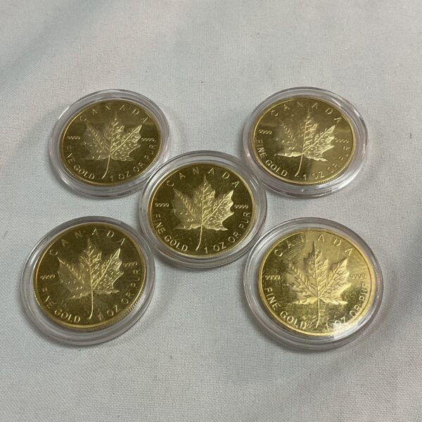 Five replica commemorative  Canada 50 dollar coins