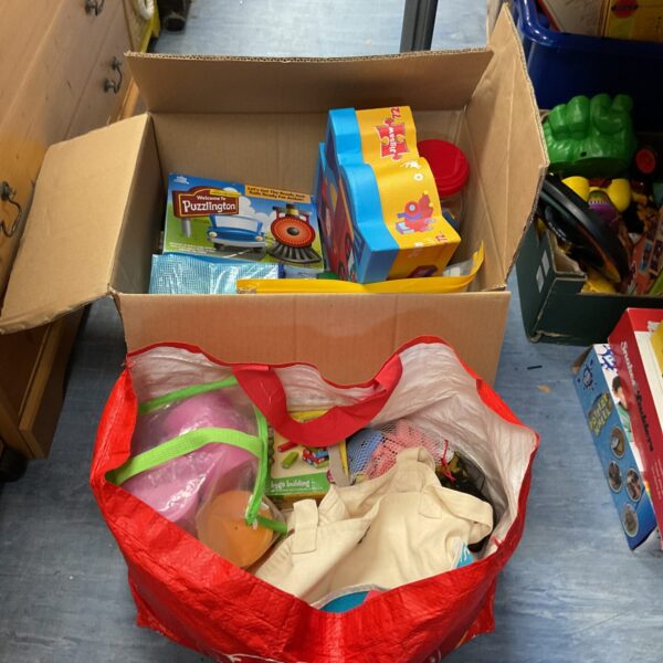 Box and bag of childrens toys and related items