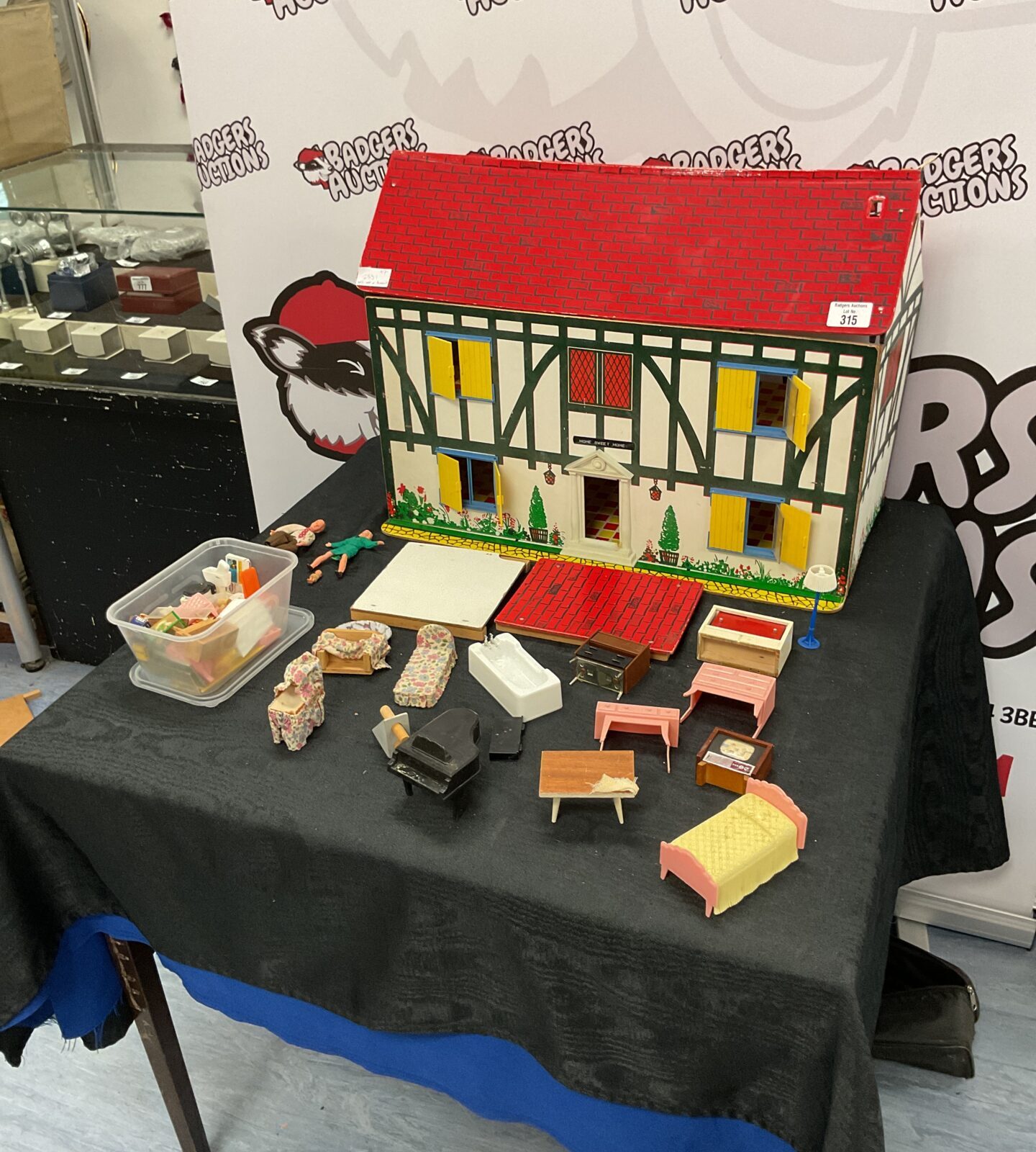 Vintage dolls house with figures and accessories inc furniture